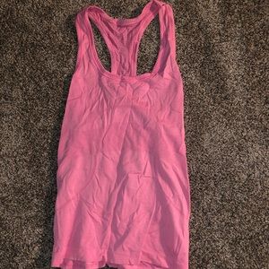 Pink lululemon tank. Gently used. Size 4